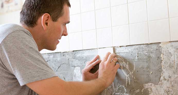 Wellington Tiling Service team tiling a bathroom